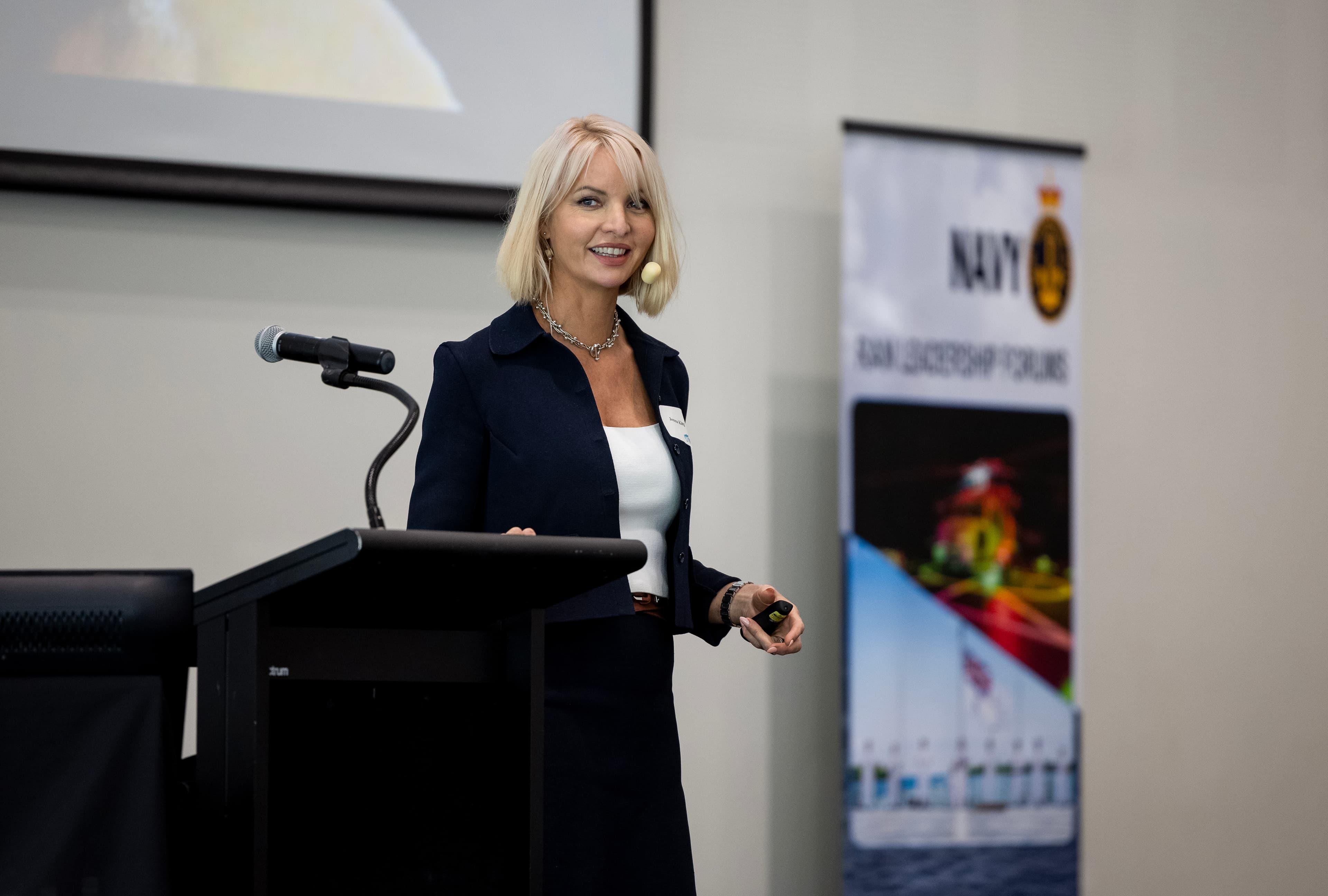 Dr Jemma King speaking on stage
