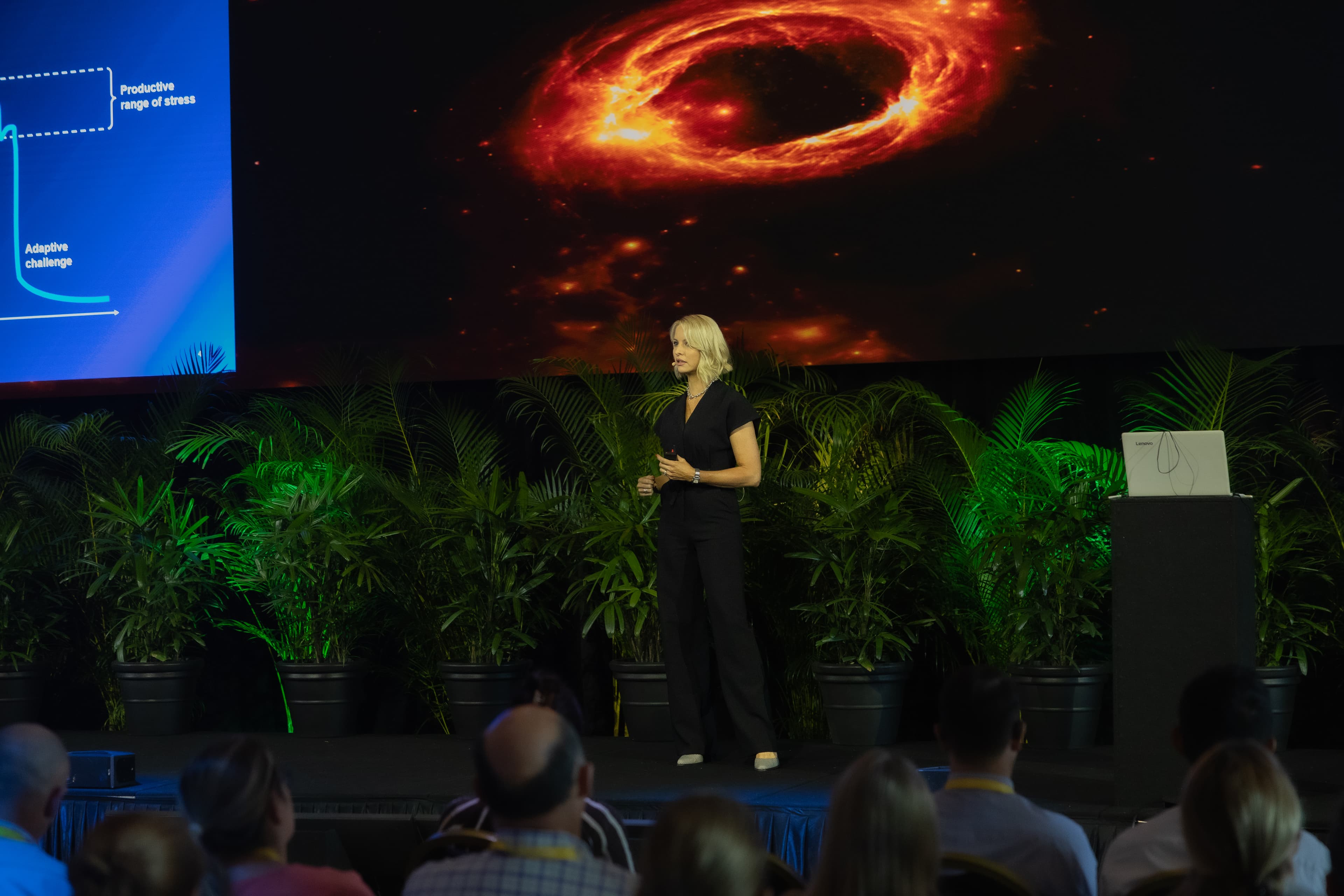 Dr Jemma King presenting to a live audience