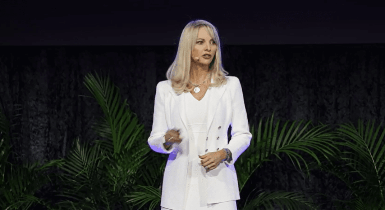Dr Jemma King speaking on stage